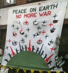 banner saying Peace on Earth, No More War