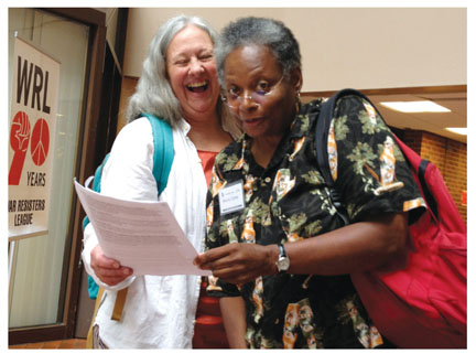 Joanne Sheehan, organizer for the Gathering, and Mandy Carter, who will speak on Saturday. Photo by Linda Thurston.