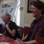 Ruth Benn and Lincoln Rice laughing during May 5, 2018 coordinator transition discussion.