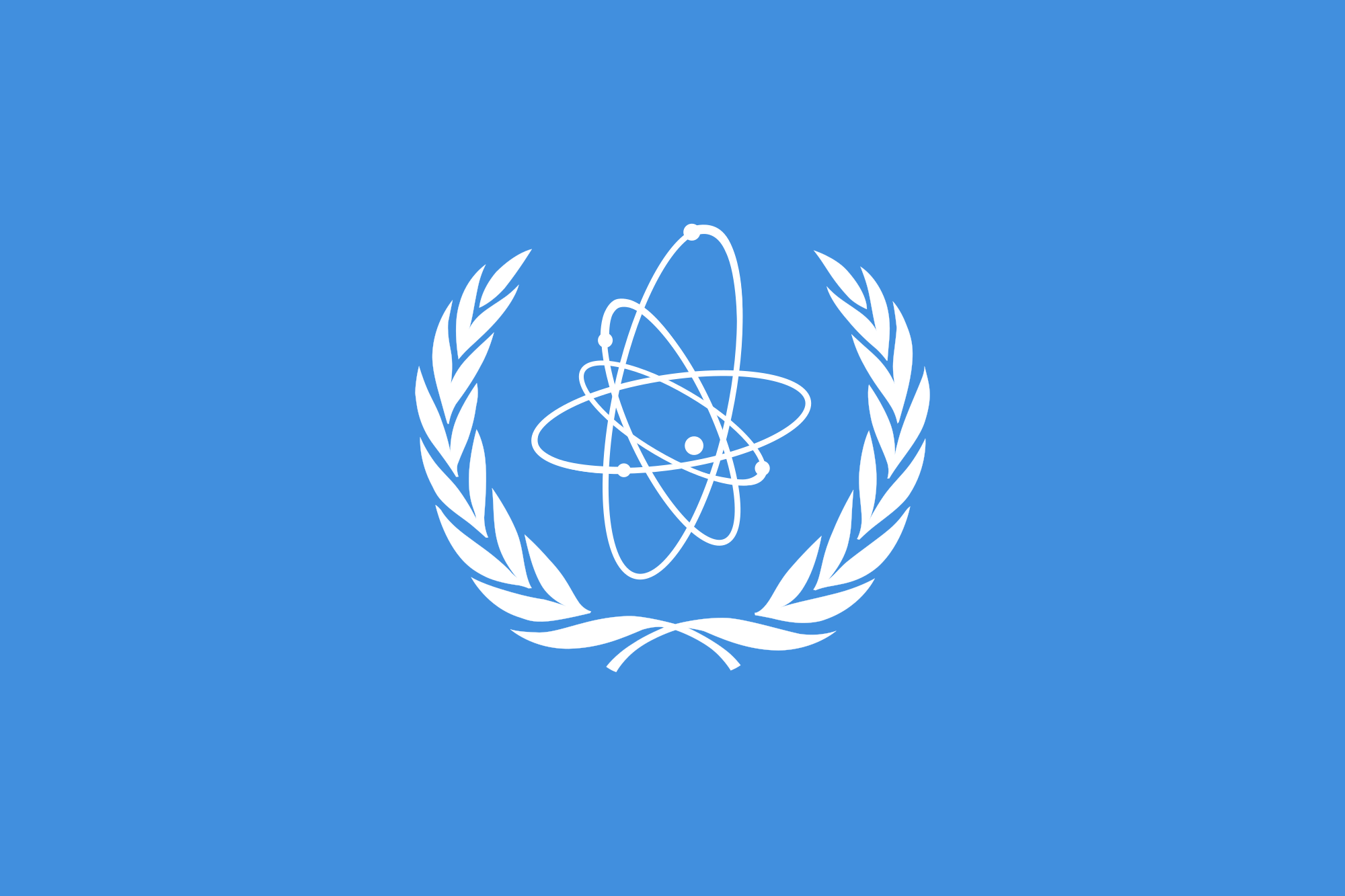 Flag of International Atomic Energy Agency with blue background, atomic particle surrounded by oak leaf branches