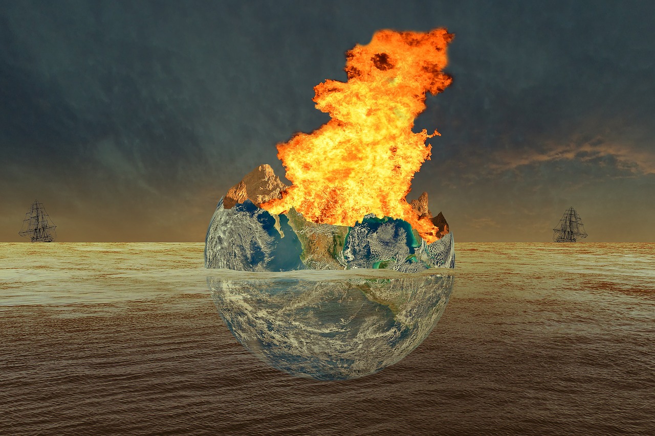 image of earth engulfed in flames in brown water