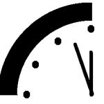 black and white image of wall clock showing a quarter of the clock with hands of the clock right before midnight