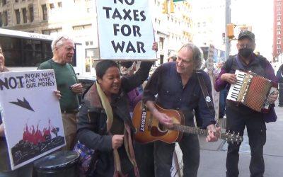singing away war at tax day protest