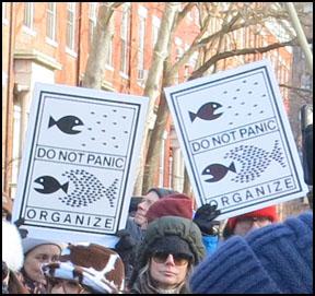 don't panic, organize signs at demonstration