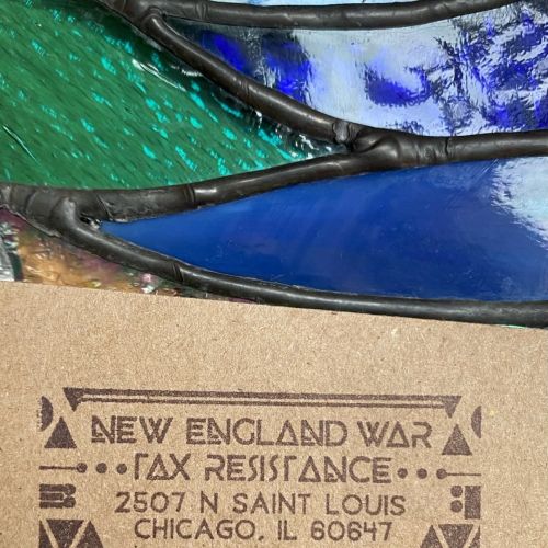 Logo for New England War Tax Resistance.